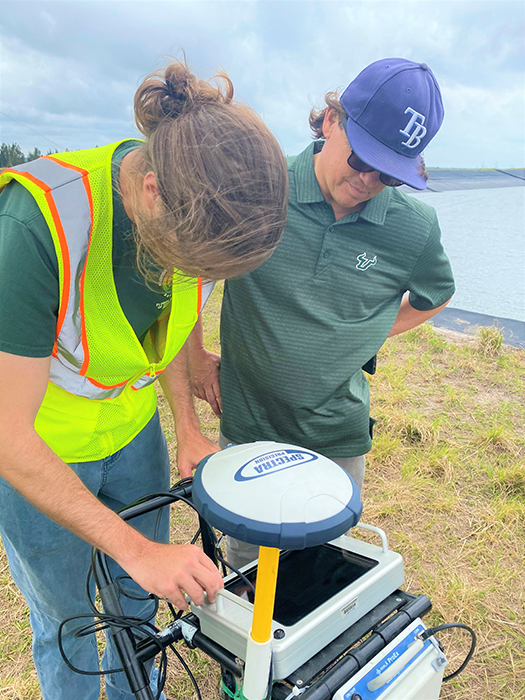Chief Science Officer Dr. Rains (right) on-site working with DEP's geologists conduct ground penetrating radar.